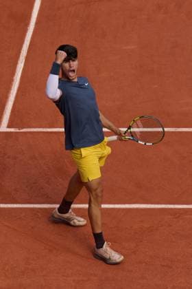 (240610) -- PARIS, June 10, 2024 -- Carlos Alcaraz celebrates scoring during the men s singles final match between Carlos Alcaraz of Spain and Alexander Zverev of Germany at the French Open tennis tournament at Roland Garros, Paris, France, June 9, 2024. ) (SP)FRANCE-PARIS-TENNIS-FRENCH OPEN-MEN S SINGLES-FINAL MengxDingbo 