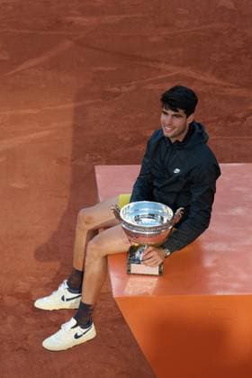 (240610) -- PARIS, June 10, 2024 -- Carlos Alcaraz reacts during the awarding ceremony after the men s singles final match between Carlos Alcaraz of Spain and Alexander Zverev of Germany at the French Open tennis tournament at Roland Garros, Paris, France, June 9, 2024. ) (SP)FRANCE-PARIS-TENNIS-FRENCH OPEN-MEN S SINGLES-FINAL MengxDingbo 