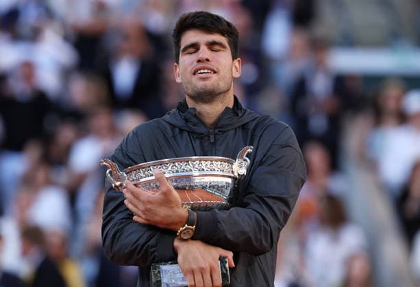 (240610) -- PARIS, June 10, 2024 -- Carlos Alcaraz reacts during the awarding ceremony after the men s singles final match between Carlos Alcaraz of Spain and Alexander Zverev of Germany at the French Open tennis tournament at Roland Garros, Paris, France, June 9, 2024. ) (SP)FRANCE-PARIS-TENNIS-FRENCH OPEN-MEN S SINGLES-FINAL GaoxJing 