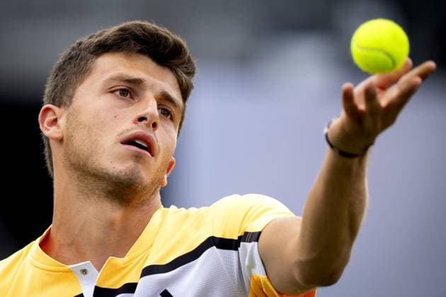 ROSMALEN - Luca Nardi (ITA) in action against David Goffin (BEL) on the third day of the Libema Open tennis tournament in Rosmalen. ANP SANDER KONING xVIxANPxSportx xxANPxIVx 500780854 originalFilename: 500780854.jpg