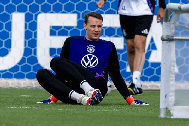 Football national team, public training on 10 06 2024 in Herzogenaurach Manuel Neuer national team Germany during stretching exercises looks thoughtfully into the round Important note According to the guidelines of FIFA or UEFA, it is prohibited to use or have used photographs taken in the stadium and or of the game in the form of sequential images and or video-like photo series Foto Kirchner Media DI Copyright: xKirchner-Media DIx