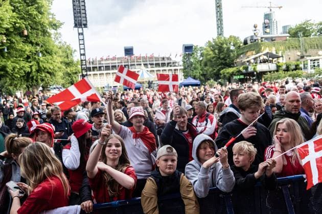 Danish fans wave flags in Tivoli in Copenhagen Monday June, 10, 2024. DBU, TV2 and Tivoli send the Danish men s national football team off to the UEFA EURO, EM, Europameisterschaft,Fussball 2024 with a live show from Tivoli in Copenhagen Copenhagen Tivoli Denmark Copyright: xKristianxTuxenxLadegaardxBergx 2E6A3467