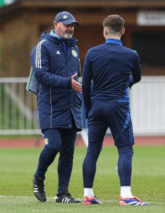 Scotland coach Coach Steve Clarke congratulates Billy Gilmour on his birthday during the training session Scotland Training Session and press conference, PK, Pressekonferenz UEFA European Championship, EM, Europameisterschaft 2024, Group A Football, Stadion am Groben, Garmisch-Partenkirchen, Germany, 11 Jun 2024 EDITORIAL USE ONLY No use with unauthorised audio, video, data, fixture lists, club league logos or live services. Online in-match use limited to 120 images, no video emulation. No use in betting, games or single club league player publications.  Copyright: xPaulxCurrie Shutterstockx 14523736ay