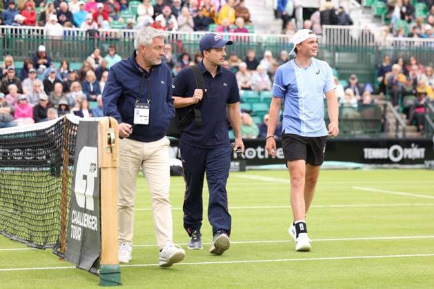 Dominic Stricker receives treatment after being hit with a ball from Daniel Evans during a round of 32 match Rothesay Open Nottingham, Day 2, Tennis, Lexus Nottingham Tennis Centre, Nottingham, UK - 11 June 2024  Copyright: xRyanxBrowne Shutterstockx 14523727co