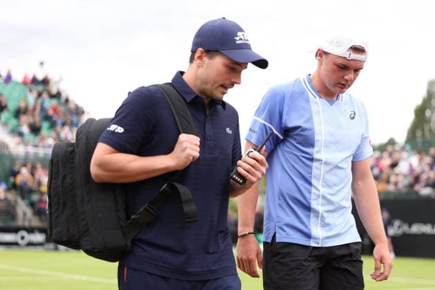 Dominic Stricker receives treatment after being hit with a ball from Daniel Evans during a round of 32 match Rothesay Open Nottingham, Day 2, Tennis, Lexus Nottingham Tennis Centre, Nottingham, UK - 11 June 2024  Copyright: xRyanxBrowne Shutterstockx 14523727cn