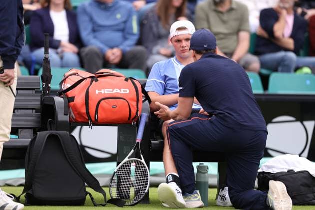 Dominic Stricker receives treatment after being hit with a ball from Daniel Evans during a round of 32 match Rothesay Open Nottingham, Day 2, Tennis, Lexus Nottingham Tennis Centre, Nottingham, UK - 11 June 2024  Copyright: xRyanxBrowne Shutterstockx 14523727cl
