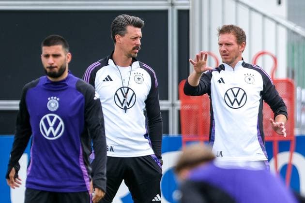 Julian Nagelsmann Germany , Coach Gestures, facial expressions, emotions, Sandro Wagner CO Coach before Deniz Undav Germany , 26 , GER, DFB, Training, Football Mens National Team Germany, UEFA European Football Championship 2024, Herzogenaurach 12 06 2024 GER, DFB, Training, Football Mens National Team Germany, UEFA European Football Championship 2024, Herzogenaurach 12 06 2024 Herzogenaurach Copyright: xEibner-Pressefoto FlorianxWieganx EP_FWD