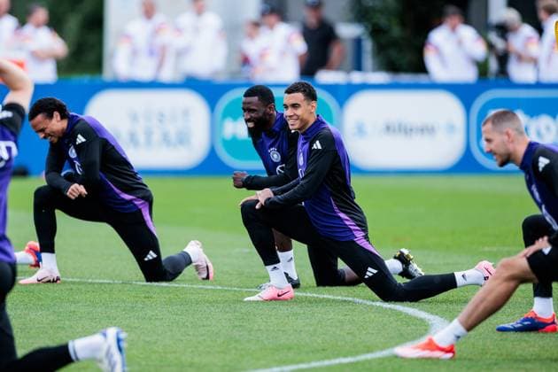 Training camp preparation UEFA EURO 2024 Germany 12 06 2024 Leroy Sane Germany, 19 , Antonio Rüdiger Germany, 2 , Jamal Musiala Germany, 10 laughing while stretching Training camp preparation UEFA EURO 2024 Germany Training HerzoBase, Herzogenaurach on 12 06 2024 Copyright: xBEAUTIFULxSPORTS Wunderlx