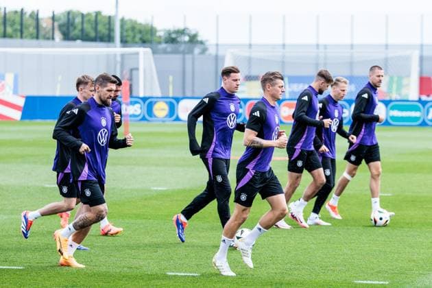 Training camp preparation UEFA EURO 2024 Germany 12 06 2024 Warm-up at the start of training Robert Andrich Germany, 23 , Toni Kroos Germany, 8 Training camp preparation UEFA EURO 2024 Germany Training HerzoBase, Herzogenaurach on 12 06 2024 Copyright: xBEAUTIFULxSPORTS Wunderlx