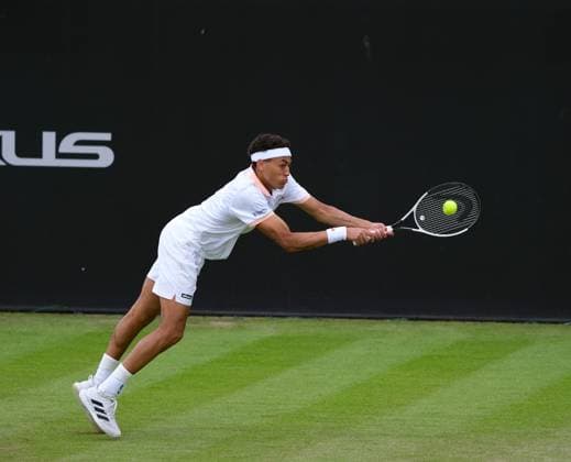 12th June 2024; Lexus Nottingham Tennis Centre, Nottingham, England; Rothesay Nottingham Open, Day 3; Paul Jubb stretches to hit a double backhand shot to Jacob Fearnley, mens singles  ActionPlus1265367320240612 PaulxBonser