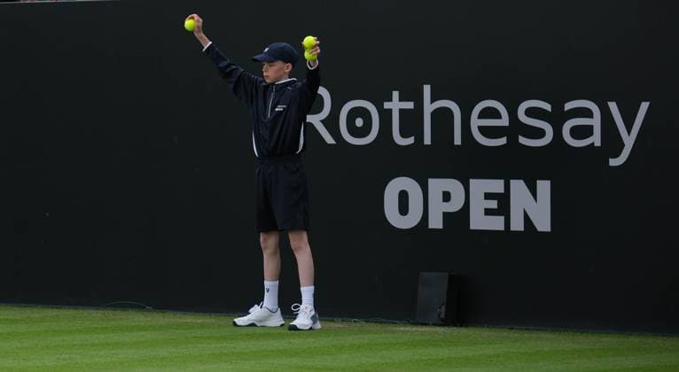 12th June 2024; Lexus Nottingham Tennis Centre, Nottingham, England; Rothesay Nottingham Open, Day 3; ball boy on centre court offers balls to the players  ActionPlus1265369920240612 PaulxBonser