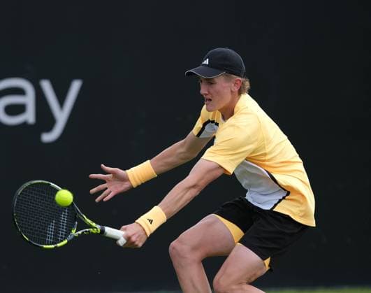 12th June 2024; Lexus Nottingham Tennis Centre, Nottingham, England; Rothesay Nottingham Open, Day 3; Henry Searle plays a backhand shot to Daniel Evans, mens singles  ActionPlus1265369020240612 PaulxBonser