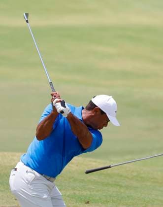 Tiger Woods hits a shot during a practice round at the 124th U.S. Open golf championship at Pinehurst Resort & Country Club in Pinehurst, N.C. on Wednesday, June 12, 2024.  NCP20240612101 JOHNxANGELILLO
