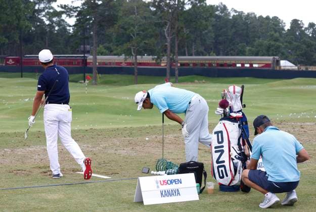 Takumi Kanaya (L) and Hideki Matsuyama of Japan warm up during a practice round at the 124th U.S. Open golf championship at Pinehurst Resort & Country Club in Pinehurst, N.C. on Wednesday, June 12, 2024.  NCP20240612114 JOHNxANGELILLO