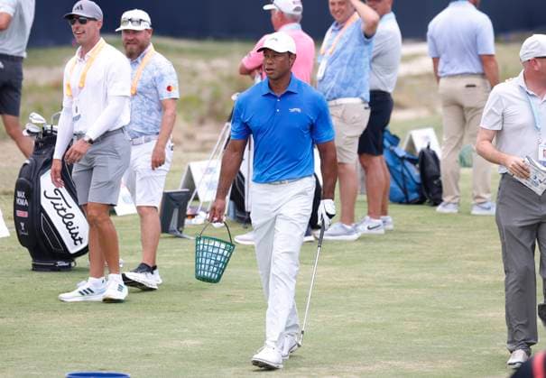 Tiger Woods walks to the driving range during a practice round at the 124th U.S. Open golf championship at Pinehurst Resort & Country Club in Pinehurst, N.C. on Wednesday, June 12, 2024.  NCP20240612116 JOHNxANGELILLO