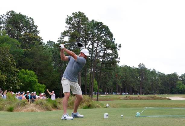 Rory McElroy of Northern Ireland tees off during a practice round at the 124th U.S. Open golf championship at Pinehurst Resort & Country Club in Pinehurst, N.C. on Wednesday, June 12, 2024.  NCP20240612127 JOHNxANGELILLO