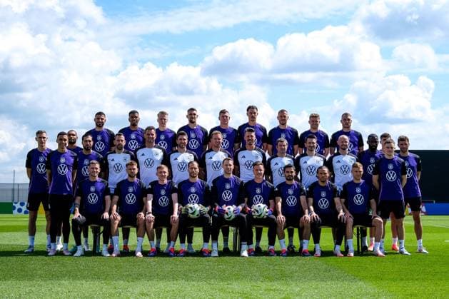 Back row from left Deniz Undav Germany, 26 , Benjamin Henrichs Germany, 20 , Chris Führich Germany, 11 , Robert Andrich Germany, 23 , Toni Kroos Germany, 8 , Robin Koch Germany, 24 , Waldemar Anton Germany, 16 , Maximilian Mittelstädt Germany, 18 , David Raum Germany, 3 Middle row from left Nico Schlotterbeck Germany, 15 , Jamal Musiala Germany, 10 , Jonathan Tah Germany, 4 , Emre Can Germany, 25 , Mads Buttgereit Assistant Coach Germany , Michael Fuchs Goalkeeping Coach Germany , Benjamin Glück Co Coach Germany , Julian Nagelsmann Coach Germany , Sandro Wagner Co Coach Germany , Andreas Kronenberg Goalkeeping Coach Germany , Nicklas Dietrich Athletics Coach Germany , Krunoslav Banovcic Athletic Trainer Germany , Antonio Rüdiger Germany, 2 , Kai Havertz Germany, 7 , Florian Wirtz Germany, 17 , Thomas Müller Germany, 13 Front row from left Pascal Groß Germany, 5 , Niclas Füllkrug Germany, 9 , Maximilian Beier Germany, 14 , Oliver Baumann Germany, 12 , Manuel Neuer Germany, 1 , Marc Andre ter Stegen Germany, 22 , Ilkay Gündogan Germany, 21 , Leroy Sane Germany, 19 , Joshua Kimmich Germany, 6 , GER, DFB, Team photo, Football mens national team Germany, UEFA European Football Championship 2024, Herzogenaurach 13 06 2024 GER, DFB, Team photo, Football mens national team Germany, UEFA European Football Championship 2024, Herzogenaurach 13 06 2024 Herzogenaurach Copyright: xEibner-Pressefoto FlorianxWieganx EP_FWD