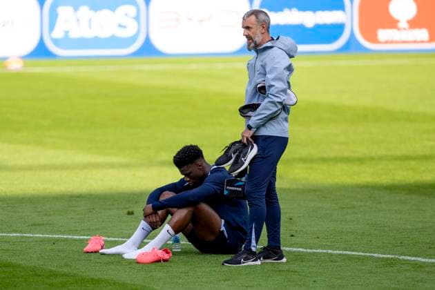 Football France national team, public training on 13 06 2024 in Paderborn before the start of Euro 2024 in Germany Aurelien Tchouameni sits disappointed on the pitch Important note According to FIFA or UEFA regulations, it is prohibited to use or have used photographs taken in the stadium and or of the match in the form of sequential images and or video-like photo series Foto Kirchner Media DI Copyright: xKirchner-Media DIx