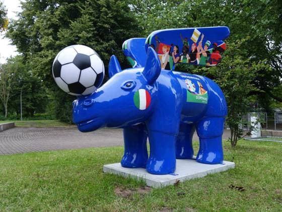 13 06,2024 Thereand, setting up the fan zone for EURO 2024 on the festival meadow in Westfalenpark Dortmund Winged rhinos in a wide variety of designs are a symbol of the city Here is an extra one for the Euro It stands in front of the entrance to the parks fan zone ewinged rhino is a