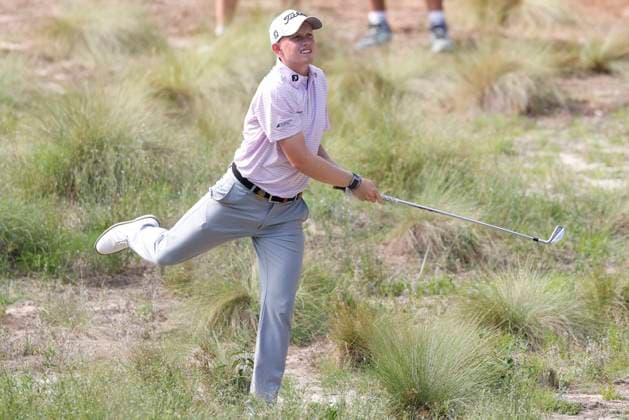 Maxwell Moldovan watches his approach shot to the eighth green during the first round of the 124th U.S. Open golf championship at Pinehurst Resort & Country Club in Pinehurst, N.C. on Thursday, June 13, 2024.  NCP20240613894 JOHNxANGELILLO