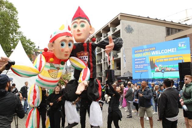 Soccer fans cavort at the EURO 2024 Fan Festival in Cologne at Heumarkt Köln North Rhine-Westphalia