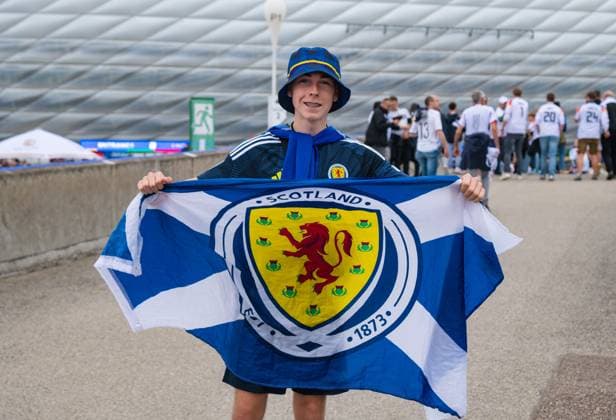 Fan of Scotland with flag during the UEFA EURO 2024 Group A match between Germany and Scotland, Munich Football Arena on June 14, 2024 in Munich, Germany Photo by Silas Schueller DeFodi Images Fan of Scotland with flag during the UEFA EURO 2024 Group A match between Germany and Scotland, Munich Football Arena on June 14, 2024 in Munich, Germany Photo by Silas Schueller DeFodi Images Defodi 0580945782st Defodi-738