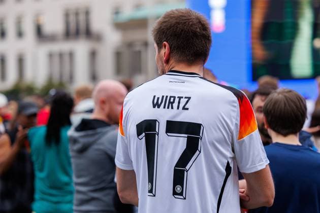 UEFA Euro 2024 Germany Scotland Fan Zone Berlin Brandenburger Tor 14 06 2024 A fan in Florian Wirtzs jersey Germany 17 Impressions from the Fan Zone at the Brandenburg Gate in Berlin for the European Championship opening match between Germany and Scotland UEFA Euro 2024 14 06 2024 Copyright: xBEAUTIFULxSPORTS Hahnex