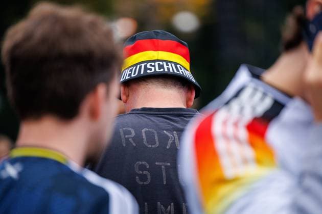 UEFA Euro 2024 Germany Scotland Fan Zone Berlin Brandenburg Gate 14 06 2024 A fan with a fishermans cap in the colors of the German flag Impressions from the fan zone at the Brandenburg Gate in Berlin for the European Championship opening match between Germany Scotland UEFA Euro 2024 14 06 2024 Copyright: xBEAUTIFULxSPORTS Hahnex