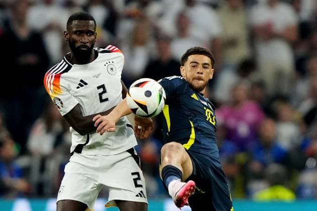 Germany s Antonio Rudiger fight for the ball with Scotland s Che Adams the Euro 2024 soccer match between Germany and Scotland at the Allianz Arena , Munich, Germany - Friday 14 , June , 2024. - Soccer .  Copyright: xSpada LaPressex