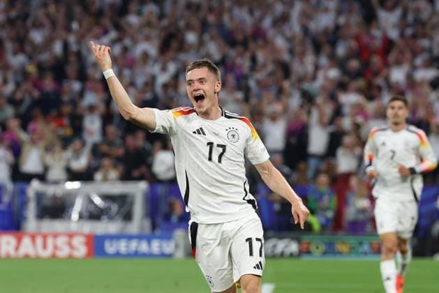 Goal celebration by Florian Wirtz 17 Germany for 1 0, Germany vs Scotland, Football, UEFA Euro 2024, Group stage, 1 Matchday, 14 06 2024 DFB regulations prohibit any use of photographs as image sequences and or quasi video Muenchen Bayern Germany Copyright: xkolbert-press ChristianxKolbertx