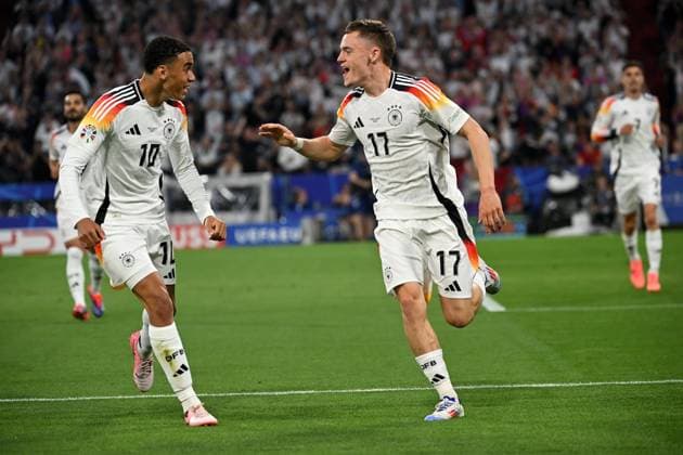 Muenchen, Munich Football Arena, 14 06 24, GER, Men, UEFA EURO 2024, Germany Scotland Picture Florian WIRTZ Germany cheers after his goal to 1 ß with Jamal MUSIALA Germany Only for editorial use UEFA regulations prohibit any use of photographs as image sequences and or quasi video Bayern Germany