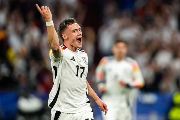 240614 Florian Wirtz of Germany celebrates after scoring the 1 0 goal during the UEFA Euro 2024 Football Championship match between Germany and Scotland on June 14, 2024 in Munich Photo Mathias Bergeld BILDBYRAN kod MB MB0933 fotboll football soccer fotballs em europamästerskap em uefa euro uefa european football championship euro 2024 deutschland germany scotland bbeng skottland jubel  Copyright: MATHIASxBERGELD BB240614MB047