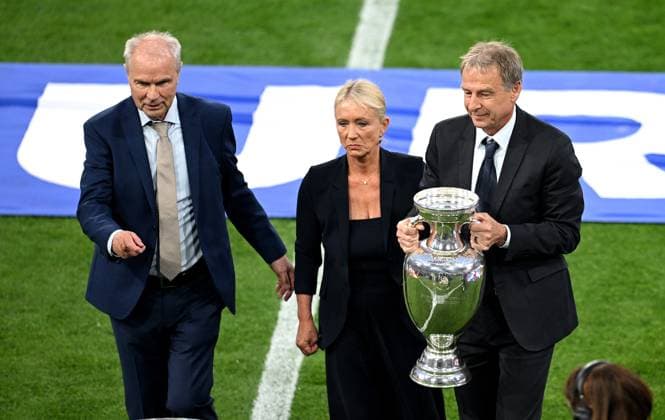 Football Euro 2024 opening match Group A 14 06 2024 Germany Scotland Opening ceremony in the arena in Munich Heidi Beckenbauer center carries the European Championship trophy into the arena in Munich, accompanied by captains of the European Championship titles of 1980, Bernard Dietz left, and 1996, Juergen Klinsmann right