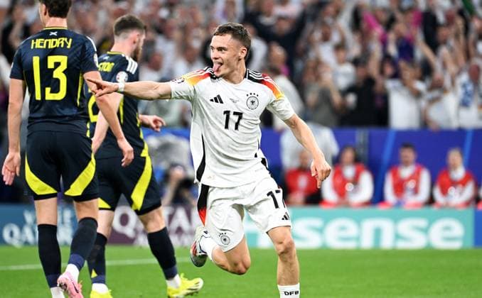 Soccer, European Championship, EURO 2024, Group A, Allianz Arena Munich Germany Scotland cheers Florian Wirtz GER after his goal for 1-0 cheers, joy, action