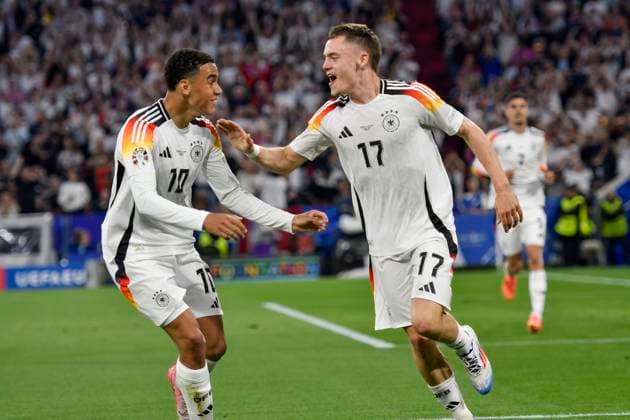 Florian Wirtz 17, Germany celebrates after scoring the 1-0 goal with Jamal Musiala 10, Germany 14 06 2024 European Football Championship in Germany Germany vs Scotland, Allianz Arena, Munich, Bayern Germany Copyright: xpepphotox xHorstxMauelshagenx pep00321, pep_20240614_hm