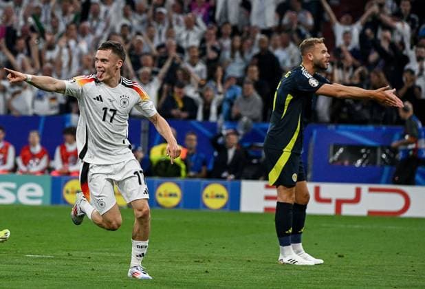 14 06 2024, xpsx, UEFA Euro 2024 preliminary round, Germany Scotland v l celebrate the goal, goal celebration for 1 0 goal scorer Florian Wirtz German national football team DFB DFL DFB REGULATIONS PROHIBIT ANY USE OF PHOTOGRAPHS as IMAGE SEQUENCES and or QUASI VIDEO Munich Bayern Germany DEU