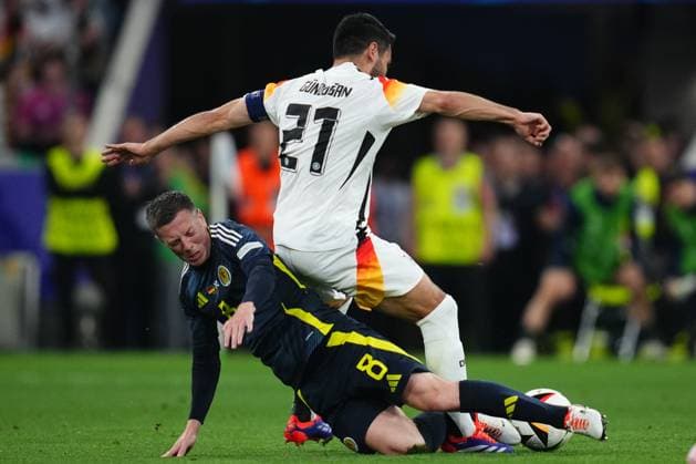 GER: Germany v Scotland. UEFA EURO, EM, Europameisterschaft,Fussball 2024 Ilkay GündoÄüan of Germany and Mcgregor of Scotland during the UEFA Euro 2024 match between Germany and Scotland, Group A, date 1, played at Allianz Arena Stadium on June 14, 2024 in Munich, Germany. kpng Copyright: xBaguxBlancox xPRESSINPHOTOx PS_240614_GER_ESC_135