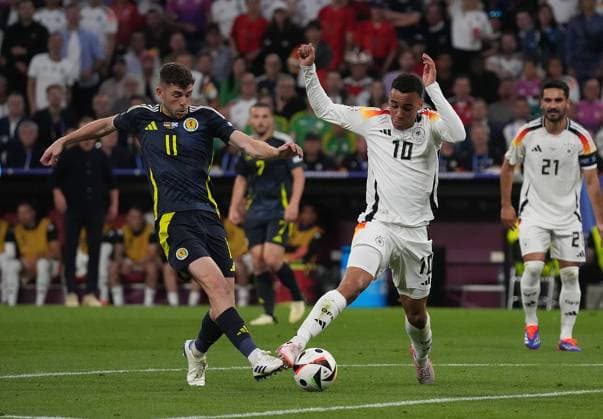 14 06 2024, Allianz Arena, Munich, GER, EM UEFA 2024, Group A, Germany vs Scotland, pictured Ryan Christie Scottland 11 , Jamal Musiala Germany 10 Defodi 506 20240614 hbr 2045 Defodi-506