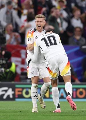 Munich, Germany, 14th June 2024. Jamal Musiala of Germany celebrates scoring their second goal during the UEFA European Championships match at Allianz Arena, Munich. Picture credit should read: David Klein Sportimage EDITORIAL USE ONLY. No use with unauthorised audio, video, data, fixture lists, club league logos or live services. Online in-match use limited to 120 images, no video emulation. No use in betting, games or single club league player publications. SPI-3194-0074