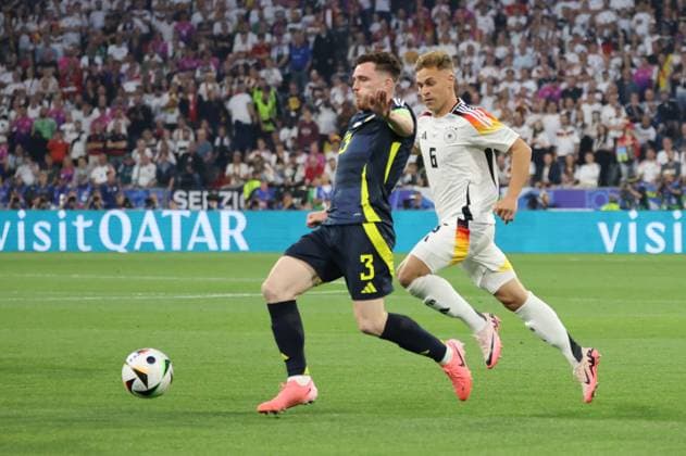 14 06 2024, Football, Men, UEFA European Championship 2024, Opening match, Group A, Germany Scotland, Joshua Kimmich Germany , Andrew Robertson Scotland Munich Allianz Arena Bayern Germany EN Copyright: xSebastianxBachx