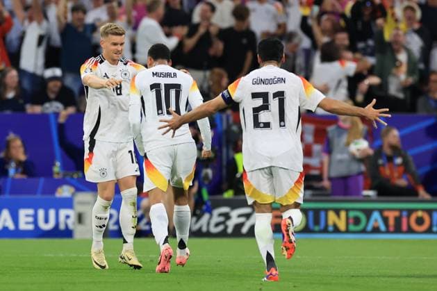 14th June 2024; Munich Football Arena, Munich, Germany; Euro 2024 Group A Football, Germany versus Scotland; 10 Jamal Musiala (GER), breaks the defense and goes on to score for 2-0 in the 19th minute and celebrates with team mates  ActionPlus12654387 PierrexTeyssot