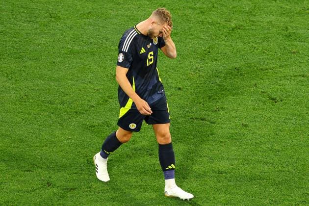 Ryan Porteous of Scotland receives a red card from Referee Clà ment Turpin after a reckless challenge on Ilkay Gündogan of Germany in the penalty area Germany v Scotland, UEFA European Championship, EM, Europameisterschaft 2024, Group A, Football, Munich Football Arena, Munich, Germany, 14 Jun 2024 EDITORIAL USE ONLY No use with unauthorised audio, video, data, fixture lists, club league logos or live services. Online in-match use limited to 120 images, no video emulation. No use in betting, games or single club league player publications. Copyright: xKieranxMcManus Shutterstockx 14523770bz