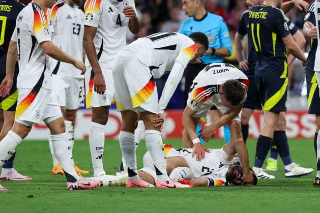 Ilkay Guendogan 21 Germany injured on the ground, Germany vs Scotland, Football, UEFA Euro 2024, Group stage, Matchday 1, 14 06 2024 DFB regulations prohibit any use of photographs as image sequences and or quasi video Muenchen Bayern Germany Copyright: xkolbert-press ChristianxKolbertx
