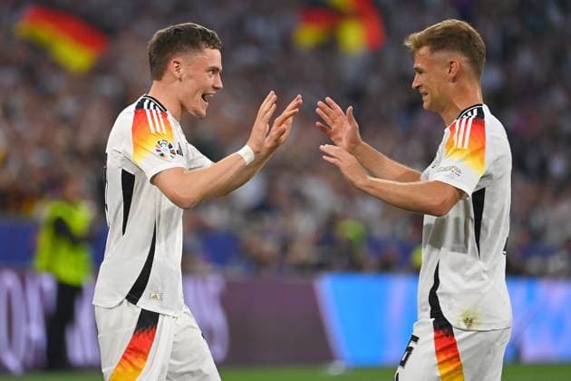 Goal celebration Florian Wirtz GER with Joshua KIMMICH GER,re after goal at 1 0, cheering,joy,enthusiasm,action group phase group A Germany GER Scotland SCO on 14 06 2024 Football Arena Munich, Football UEFA EURO 2024 GERMANY from 14 06 2024 14 07 2024