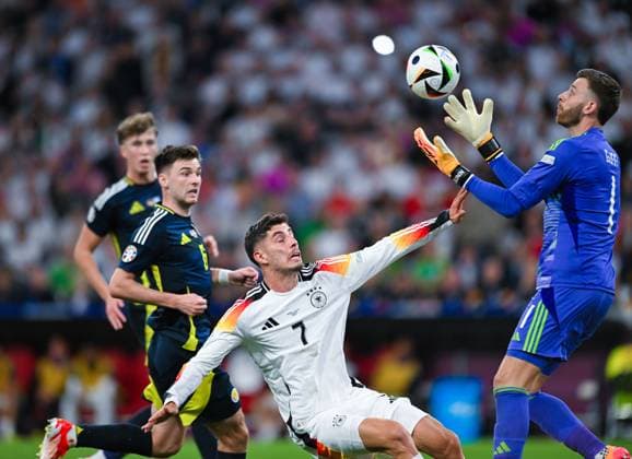 Kai Havertz Germany and goalkeeper Angus Gunn Scotland in a duel, UEFA EURO 2024 Group A, Germany vs Scotland, Munich Football Arena on June 14, 2024 in Munich, Germany Photo by Silas Schueller DeFodi Images Kai Havertz Germany and goalkeeper Angus Gunn Scotland battle for the ball, UEFA EURO 2024 Group A, Germany vs Scotland, Munich Football Arena on June 14, 2024 in Munich, Germany Photo by Silas Schueller DeFodi Images Defodi 0580992507st Defodi-738