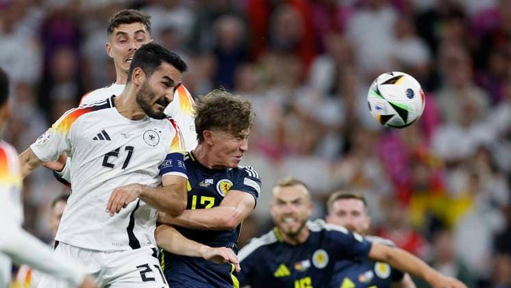14 06 2024, Football, European Championship, Germany Scotland, GER, Munich, Munich Football Arena, picture from left Ä°lkay Guendogan Germany, 21 and Jack Hendry Scotland, 13 Copyright: HMBxMedia xHeikoxBecker
