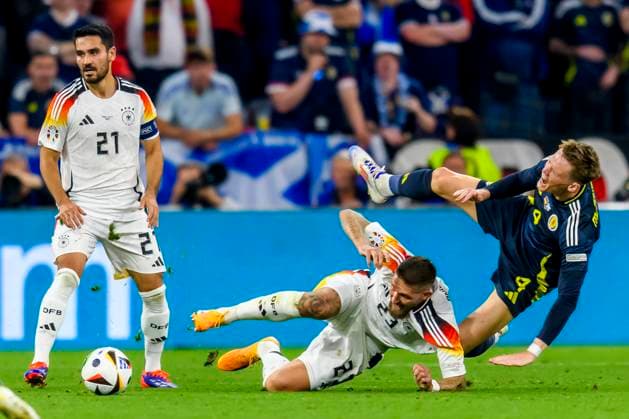 GER, UEFA Euro 2024, Group A, Germany GER vs Scotland SCO 14 06 2024, Allianz Arena, Muenchen, GER, UEFA Euro 2024, Group A, Germany GER vs Scotland SCO , pictured lkay Gündo to Ilkay Guendogan Germany 21 in duel against Scott McTominay Scottland 4 with lkay Gündo to Ilkay Guendogan Germany 21 nordphotoxGmbHx xStraubmeier nph00004