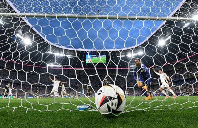 14 06 2024, xscotx, Football EM 2024, Germany Scotland, emspor, v l Florian Wirtz German National Football Team DFB , Angus Gunn Team Scotland Goal scored, scores the goal to make it 1 0 Munich