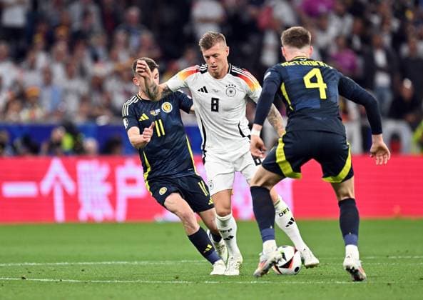 14 06 2024, xscotx, European Football Championship 2024, Germany Scotland, emspor, v l Ryan Christie Team Scotland , Toni Kroos German National Football Team DFB , Scott Mctominay Team Scotland Munich