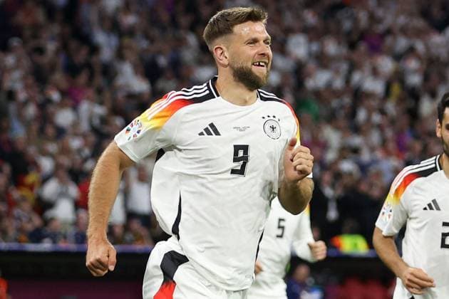 Niclas Füllkrug of Germany celebrates scoring the goal for their side with their teammates to make it 4-0 Germany v Scotland, UEFA European Championship, EM, Europameisterschaft 2024, Group A, Football, Munich Football Arena, Munich, Germany, 14 Jun 2024 EDITORIAL USE ONLY No use with unauthorised audio, video, data, fixture lists, club league logos or live services. Online in-match use limited to 120 images, no video emulation. No use in betting, games or single club league player publications. Copyright: xPaulxCurrie Shutterstockx 14523776fi